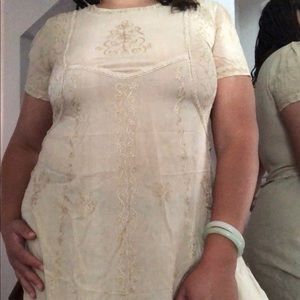 Sheer cottage core, fairy dress with embroidered detail.